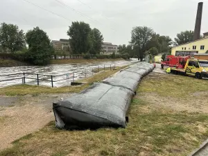 Foto: Nedělní den je nekritičtější. Záplavy pohltily několik měst Foto: Nedělní den je nekritičtější. Záplavy pohltily několik měst